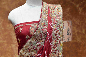 Royal Maroon Bandhani Saree with Intricate Golden Embroidered Border