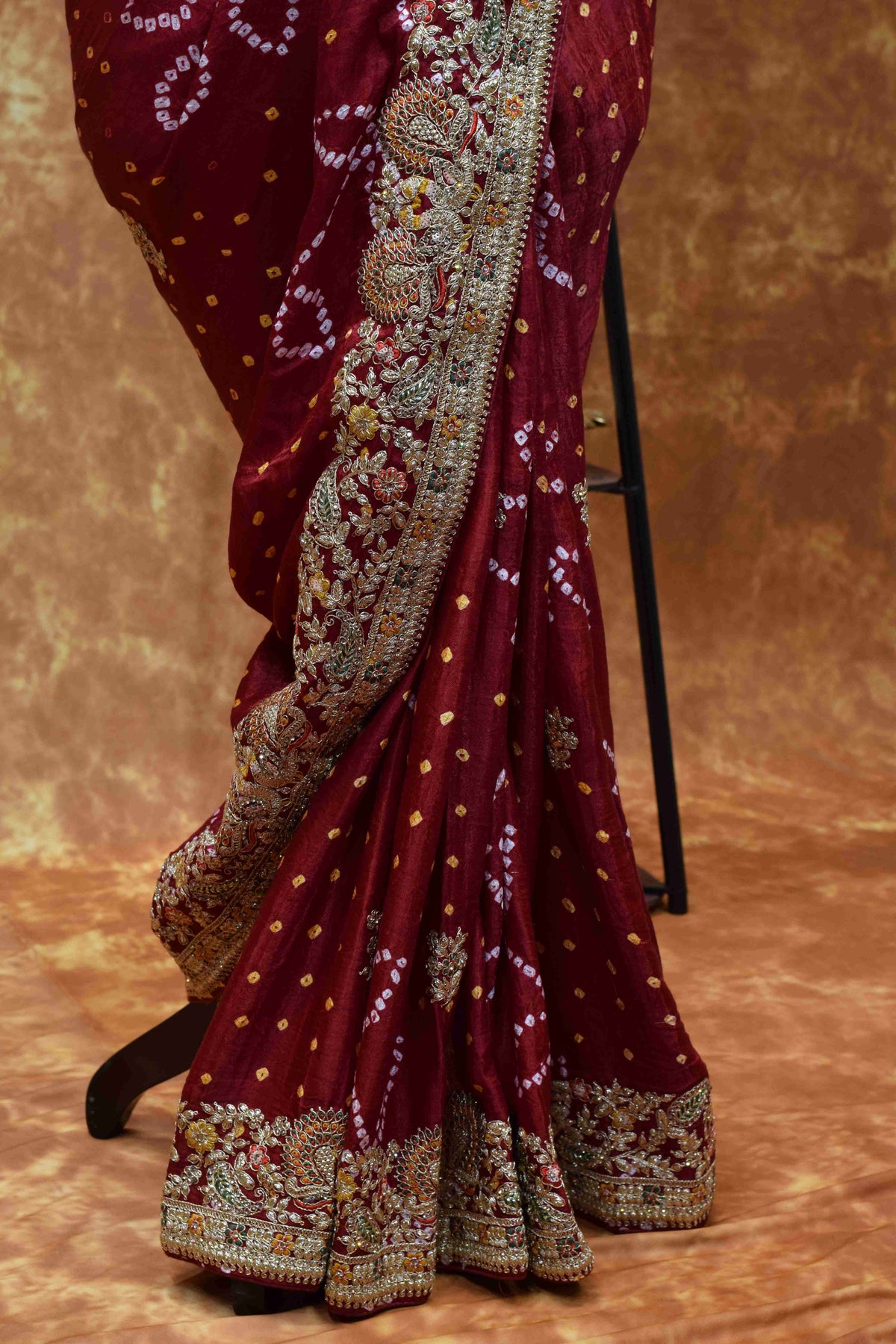 Royal Maroon Bandhani Saree with Intricate Golden Embroidered Border