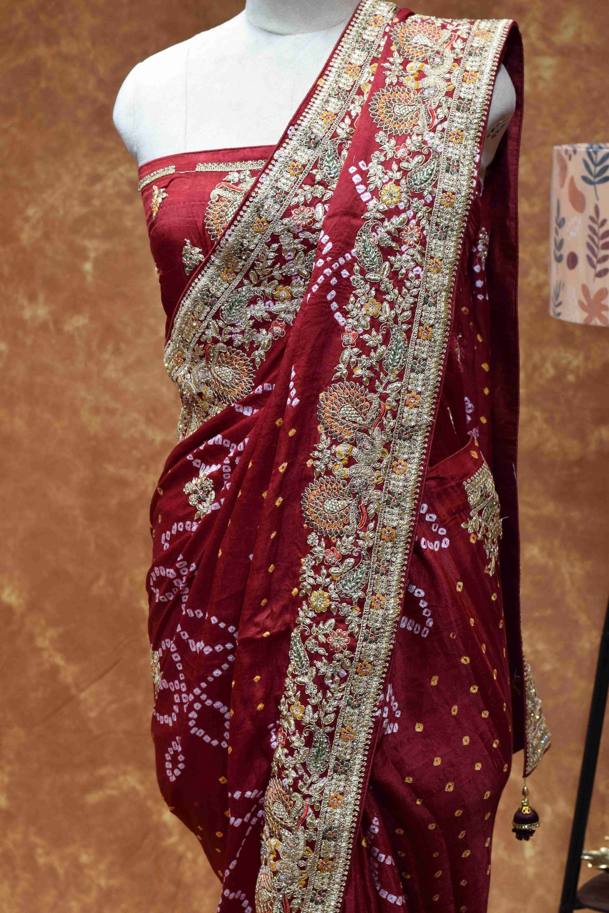 Royal Maroon Bandhani Saree with Intricate Golden Embroidered Border
