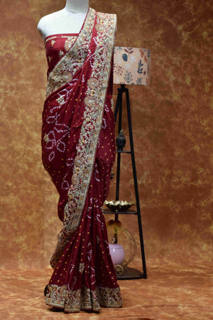 Royal Maroon Bandhani Saree with Intricate Golden Embroidered Border