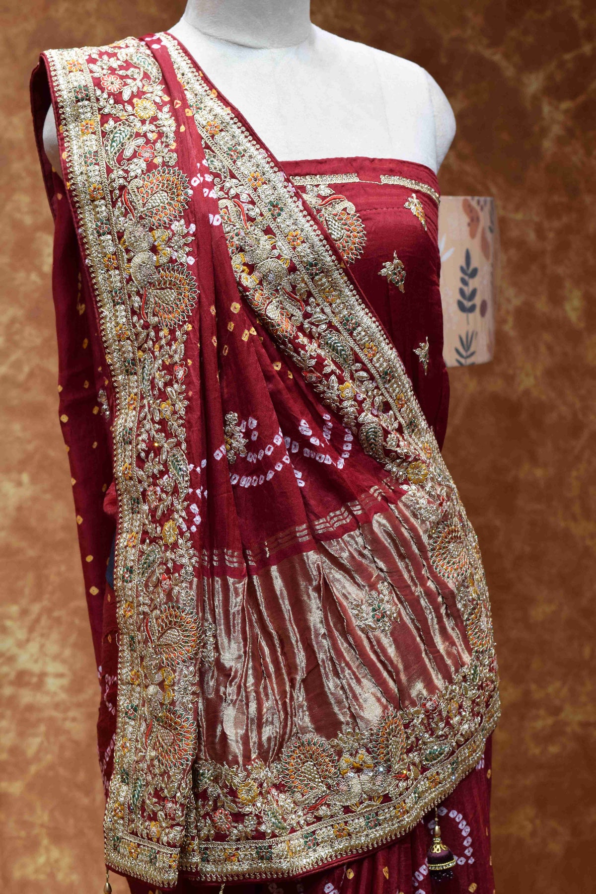 Royal Maroon Bandhani Saree with Intricate Golden Embroidered Border