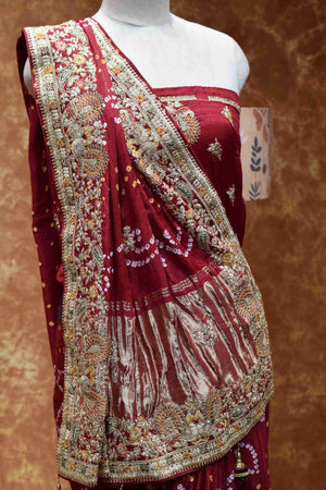 Royal Maroon Bandhani Saree with Intricate Golden Embroidered Border