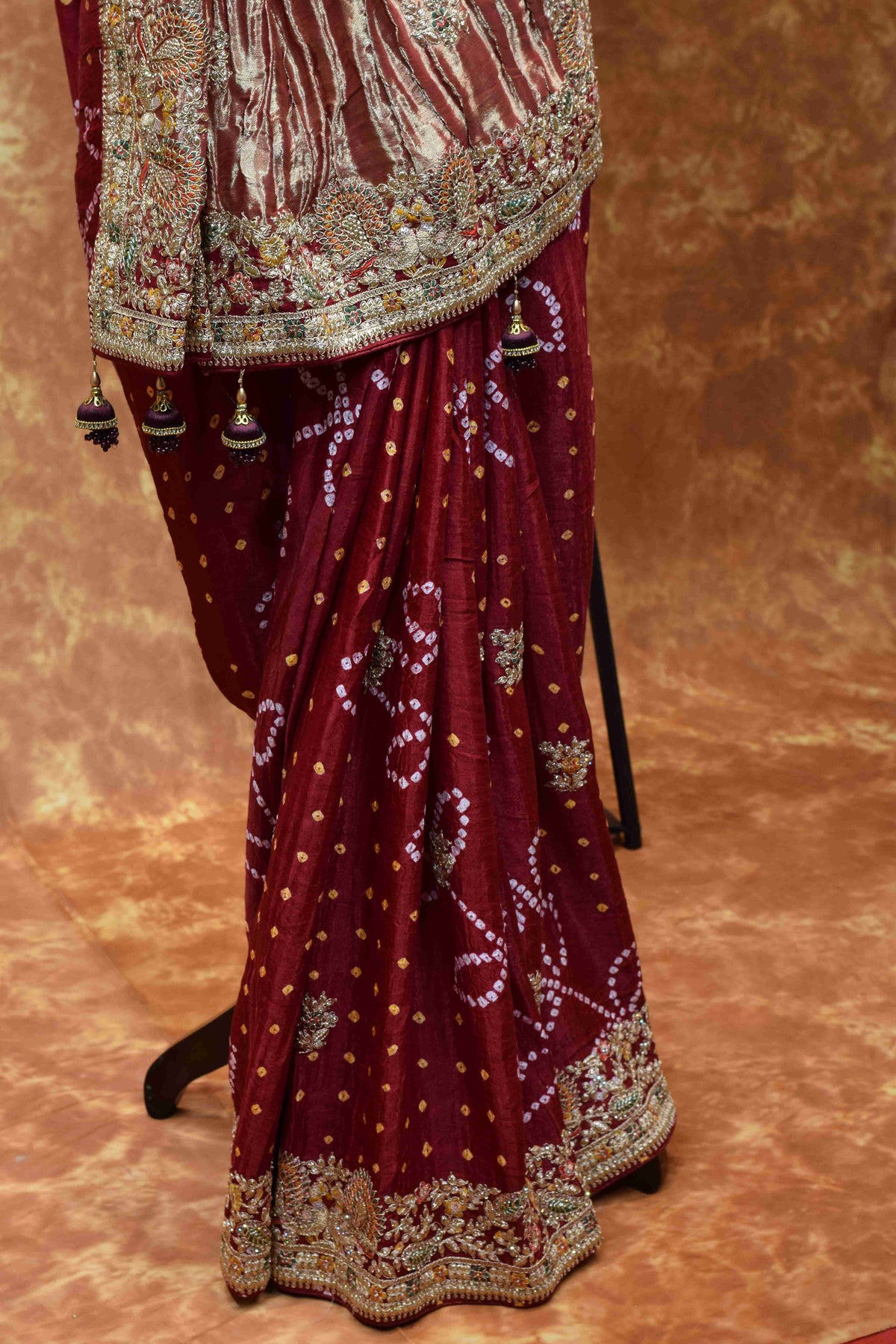 Royal Maroon Bandhani Saree with Intricate Golden Embroidered Border