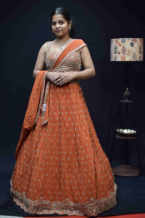 Elegant Peach Orange Lehenga Saree with Intricate Silver Embroidery