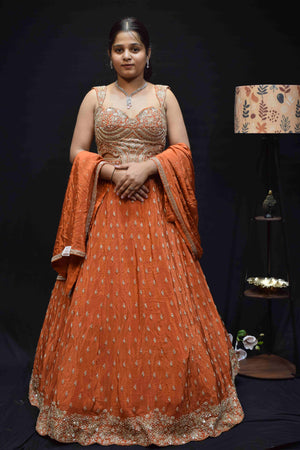 Elegant Peach Orange Lehenga Saree with Intricate Silver Embroidery