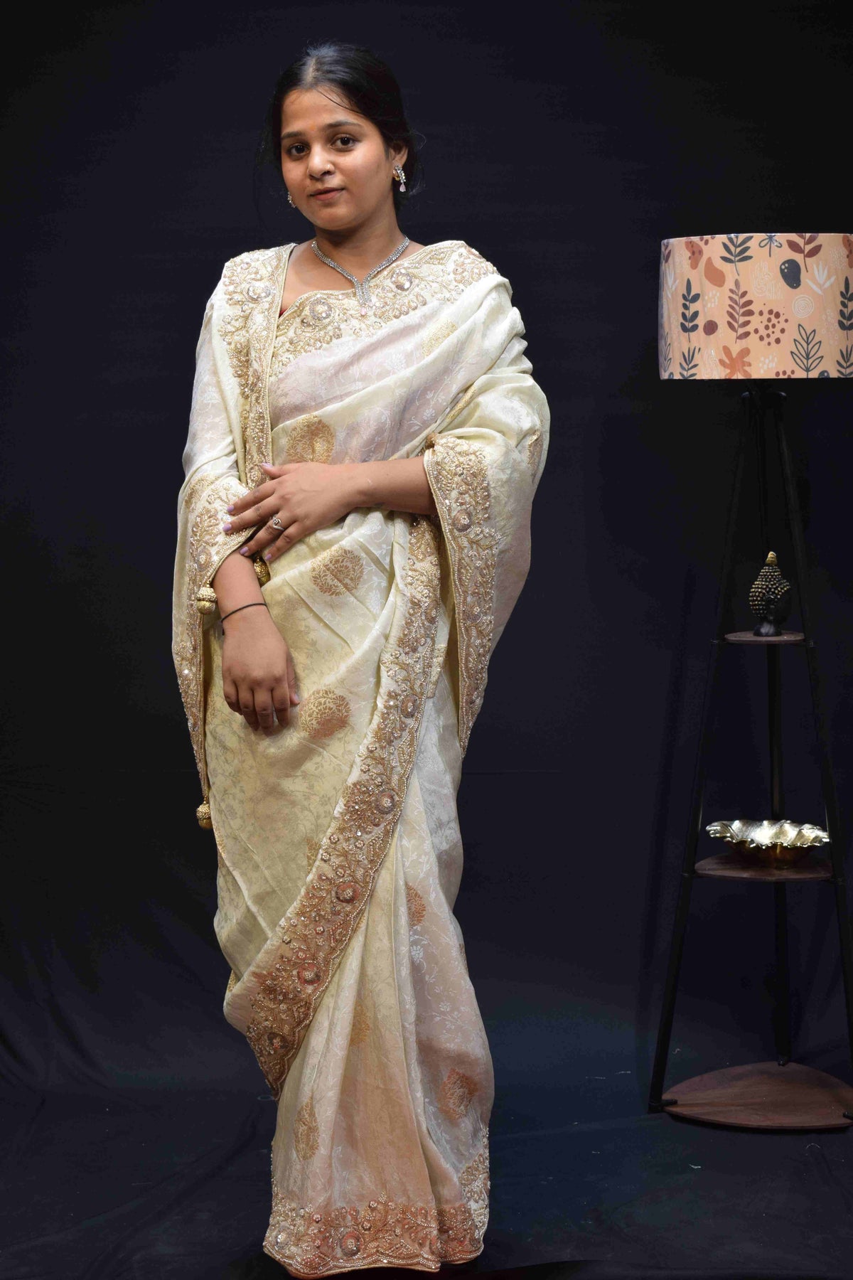 Elegant Ivory White Banarasi Saree with Intricate Gold Embroidered Border