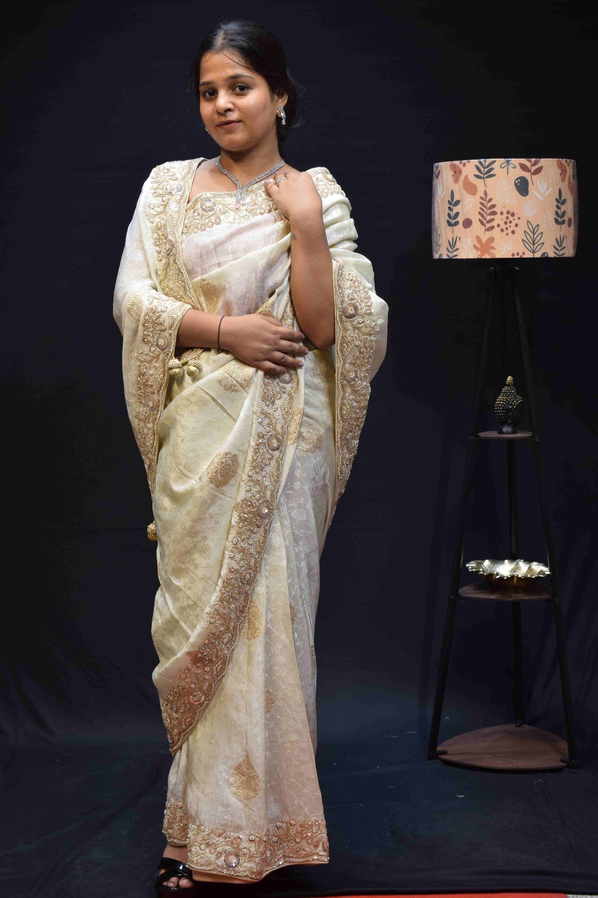 Elegant Ivory White Banarasi Saree with Intricate Gold Embroidered Border
