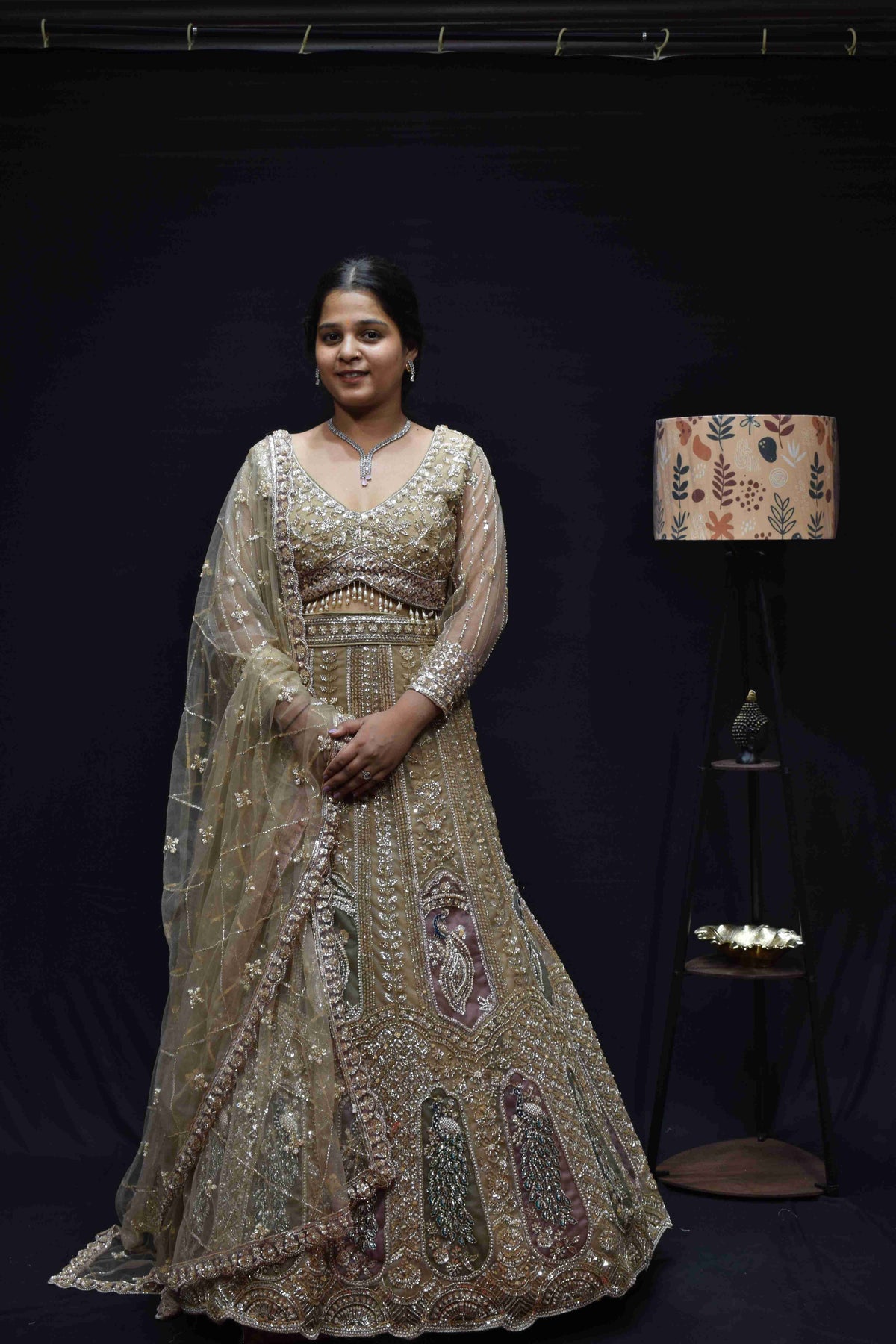 Elegant Champagne Gold Bridal Lehenga with Peacock Embroidery