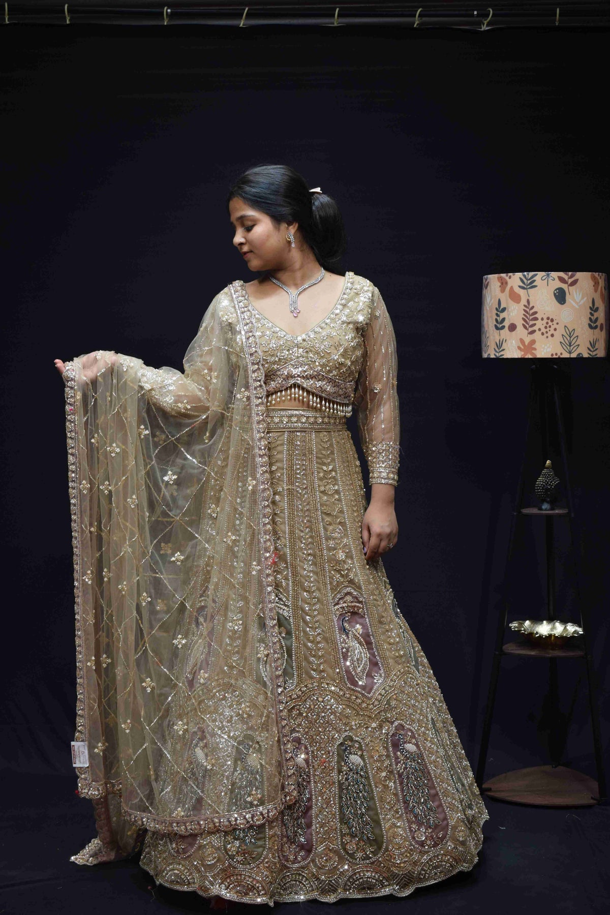 Elegant Champagne Gold Bridal Lehenga with Peacock Embroidery