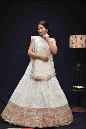 Luxury Ivory Gold Bridal Lehenga with Intricate Embroidery