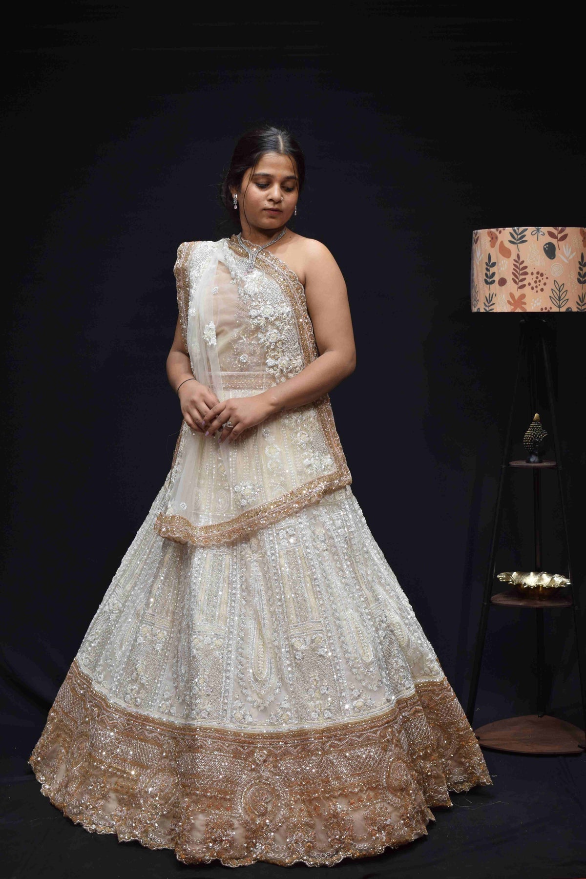 Luxury Ivory Gold Bridal Lehenga with Intricate Embroidery